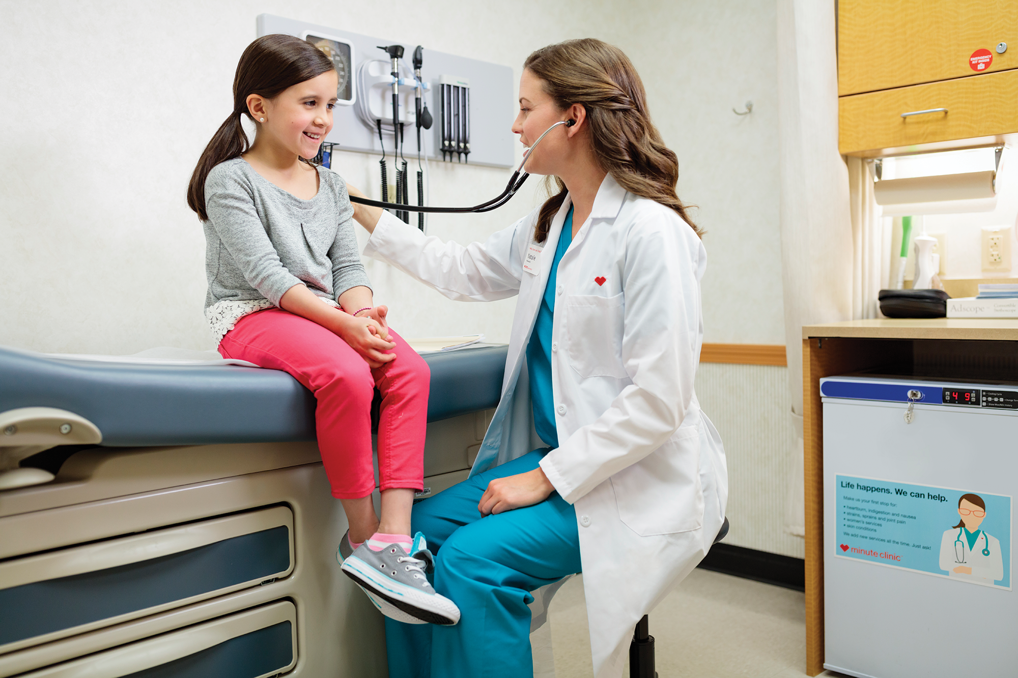 Child getting an exam at MinuteClinic